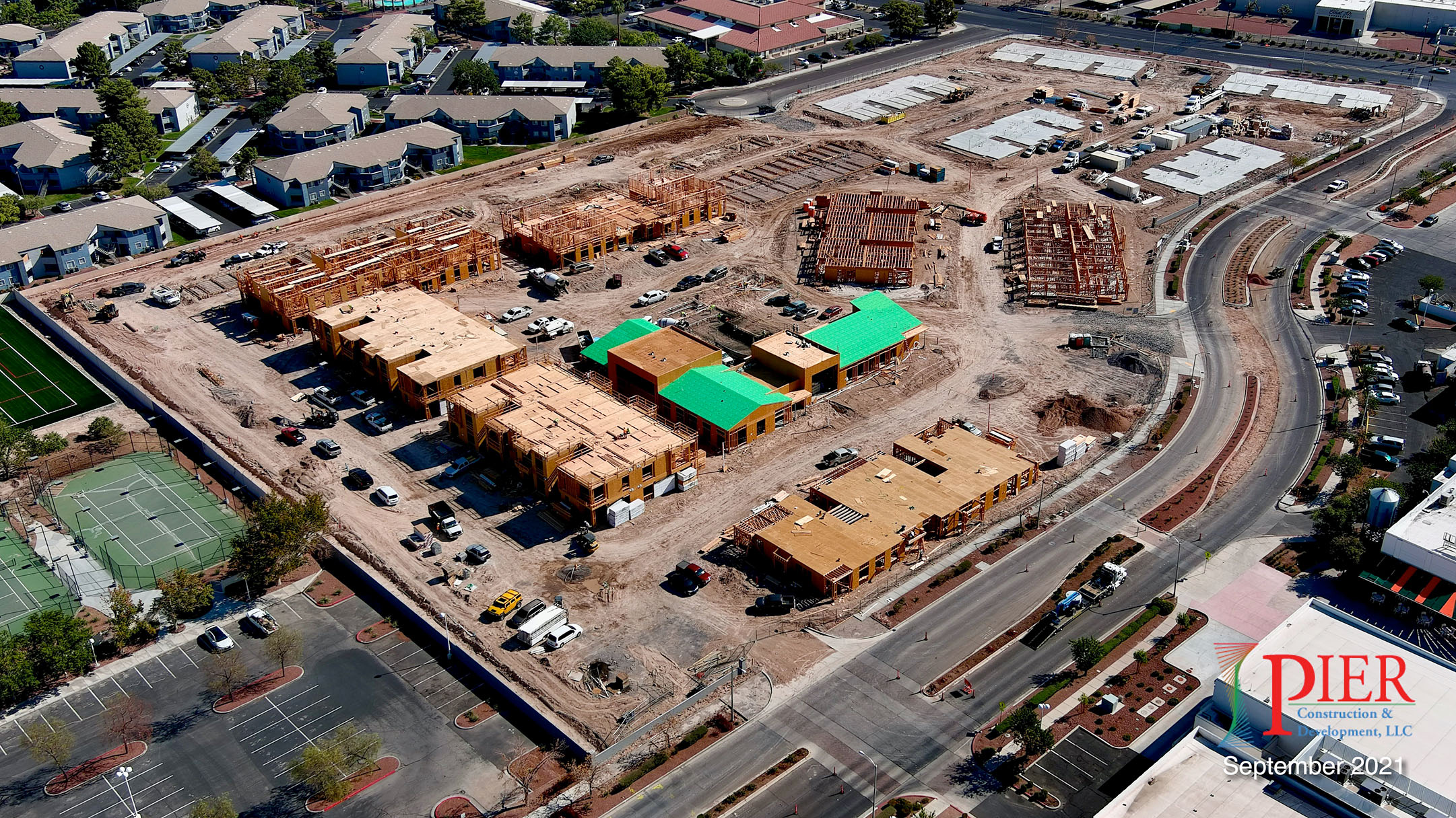 Aerial photo of construction on the 23-building Green Valley Town Center Apartments