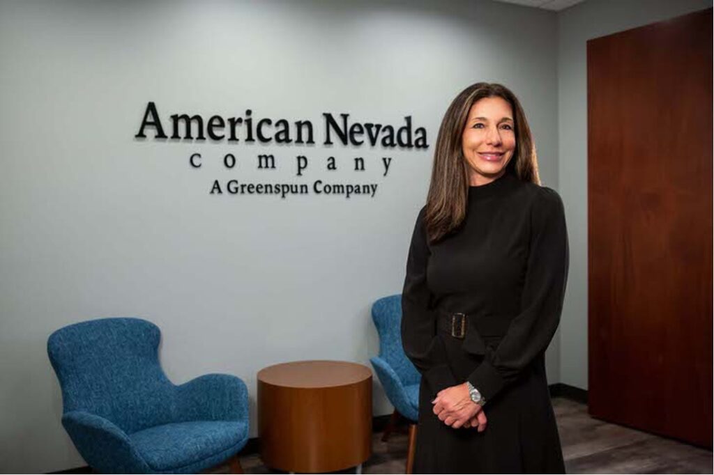 Natalie Allred standing in the American Nevada Co. office.