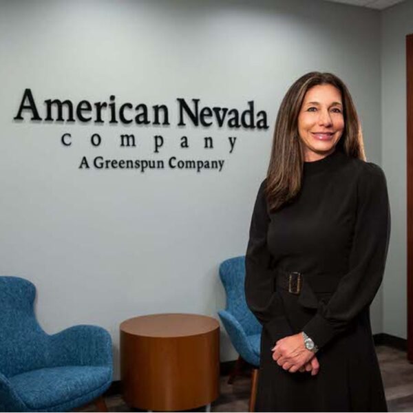 Natalie Allred standing in the American Nevada Co. office.