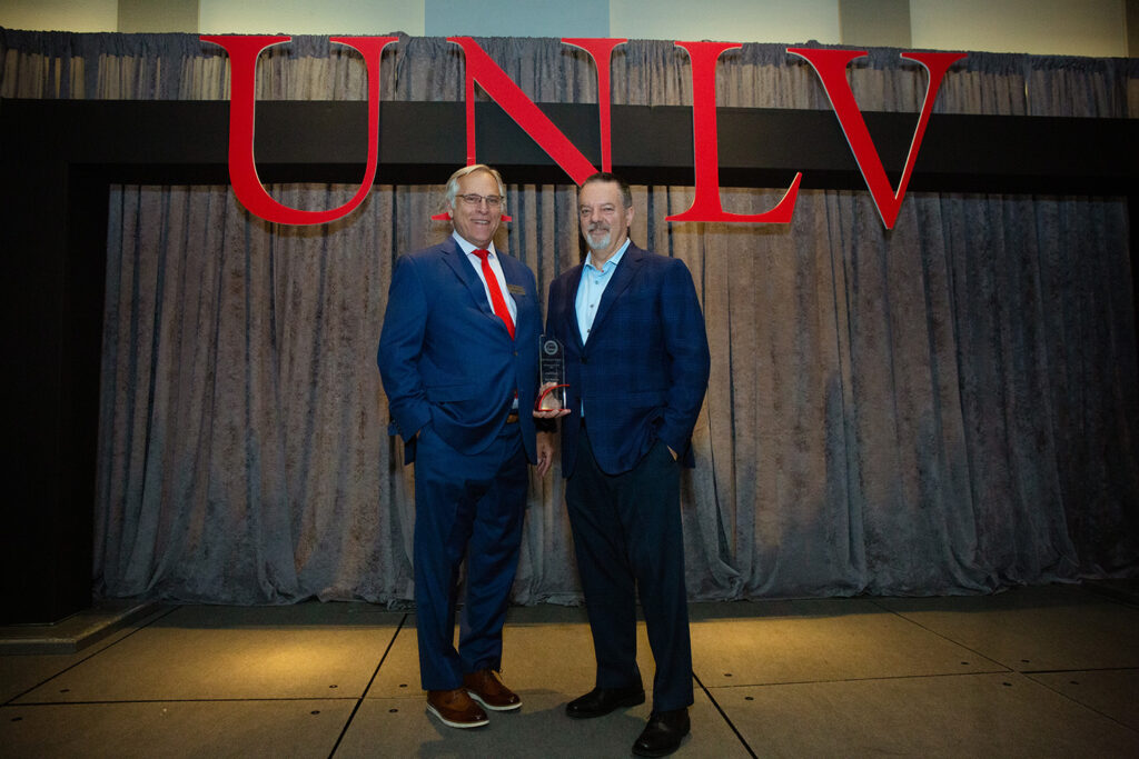 Phil Ralston receiving UNLV Alumni award.